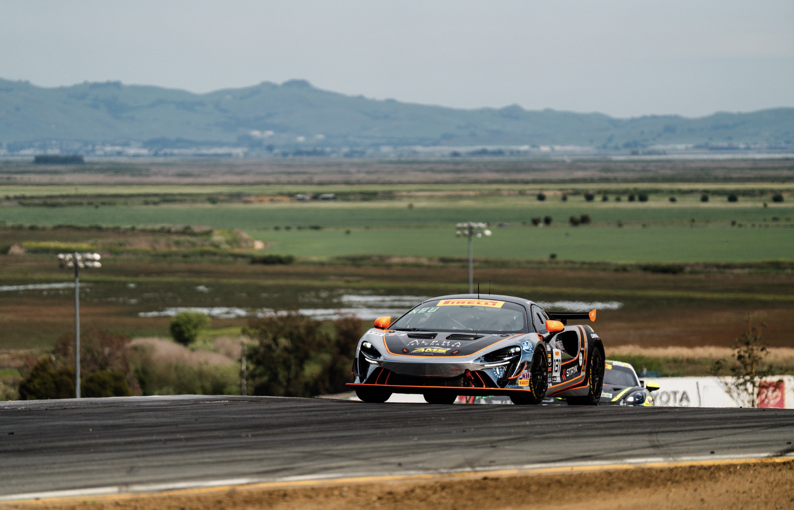 Austin Jurs' McLaren Artura GT4 number 43 cornering at Sonoma Raceway